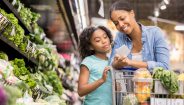 Mother and daughter in the grocery store Mother and daughter in the grocery store