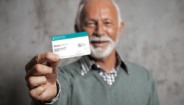 Man holding his Member identification card