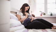 woman holding baby woman holding baby