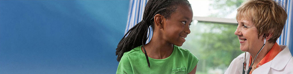 girl talking to her doctor