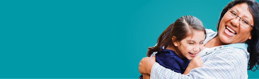 Mother and daughter smiling